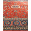 Richly colored Oriental rug with intricate geometric and floral motifs