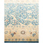 Detailed and ornate area rug with intricate patterns and floral motifs.