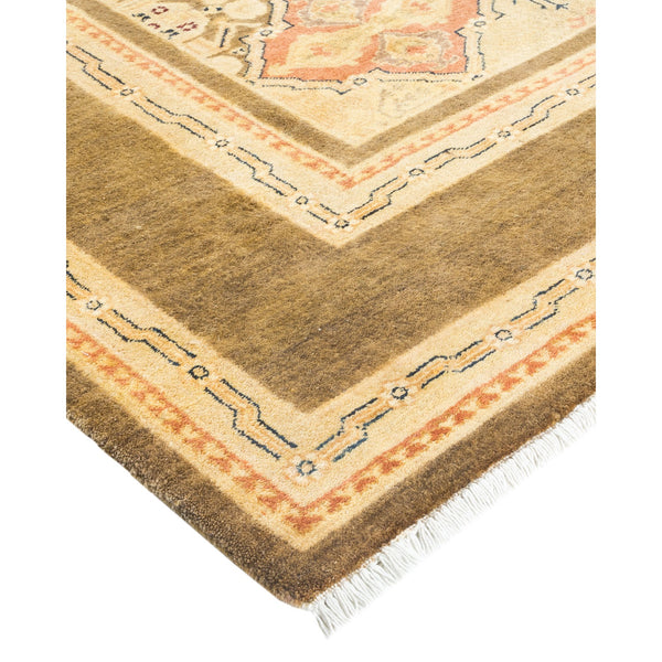 Traditional Southwestern-inspired rug with geometric patterns and sandy color.