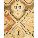 Intricately designed, symmetrical rug with floral and geometric motifs.
