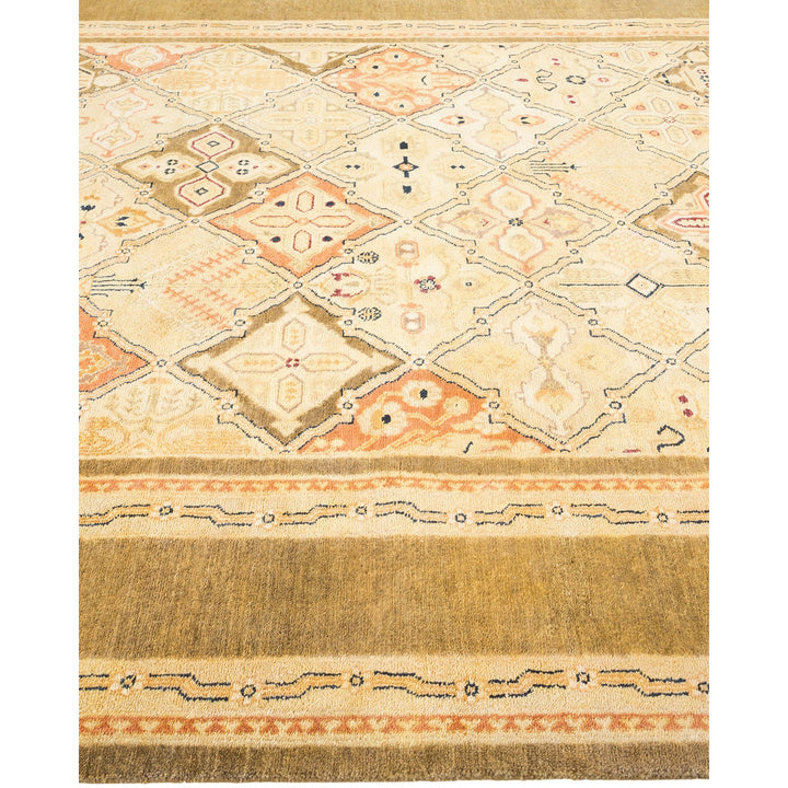 Close-up of an ornate, geometric rug with muted tones and intricate patterns.