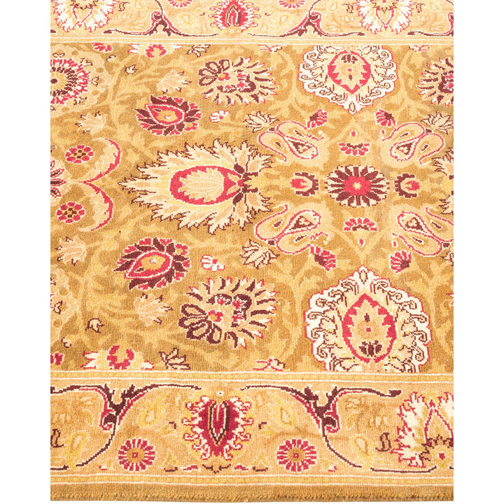 Ornate and symmetrical carpet with intricate traditional motifs and colors.