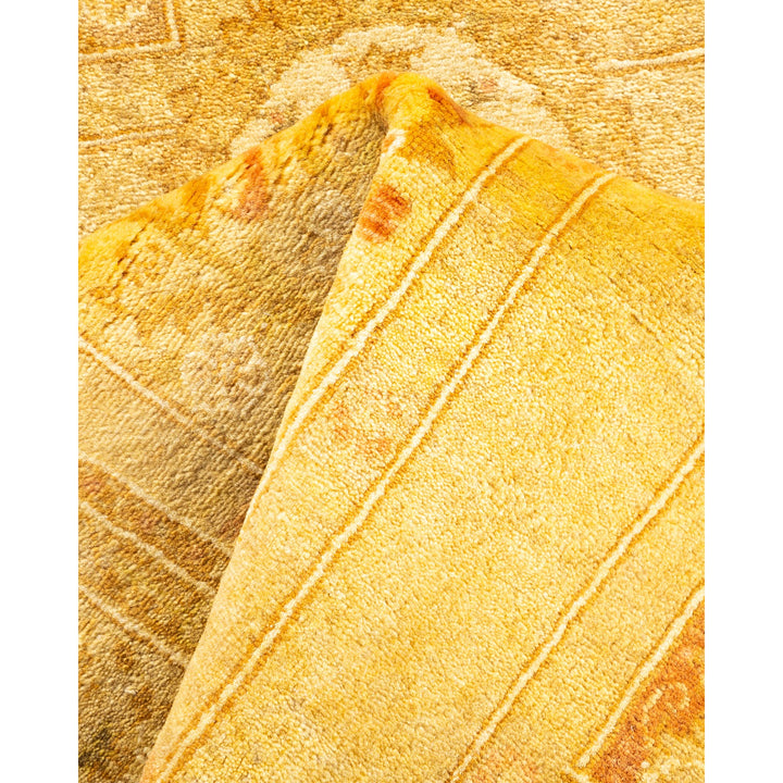 Close-up of a plush, textured woven fabric with warm tones.