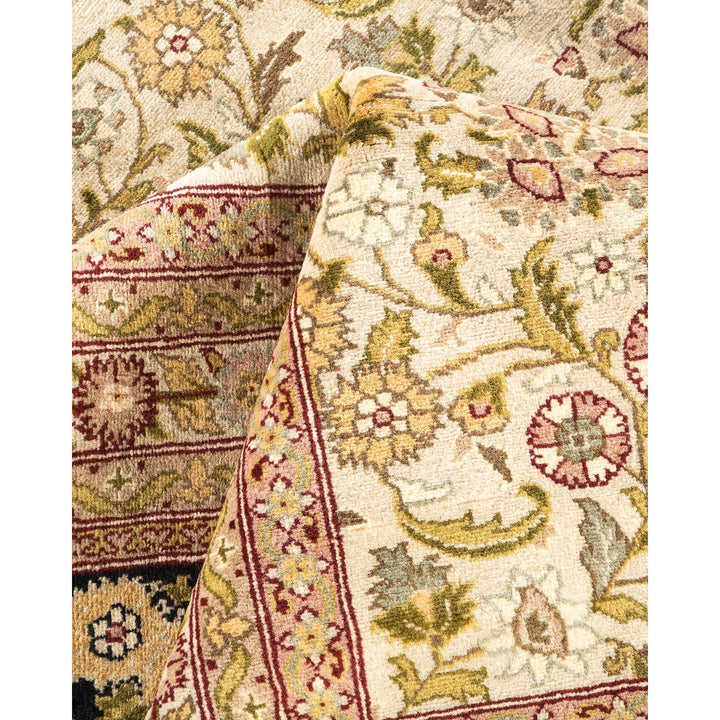 Close-up of an ornate rug with intricate floral motifs.