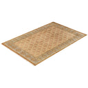 An elegant, traditional area rug with intricate geometric patterns.