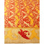 An exquisite, well-preserved rug flaunts intricate red and gold motifs.
