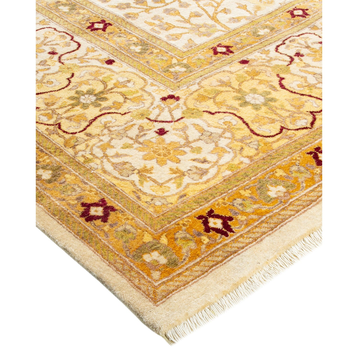 An ornate corner of a traditional rug with intricate patterns.