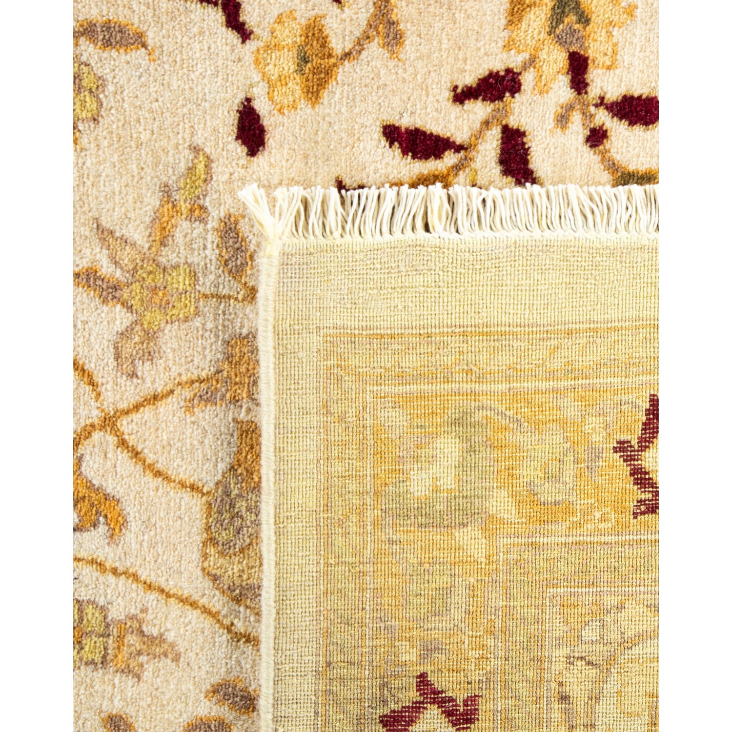 Close-up of textured floral carpet fabric contrasts with minimalist weave.