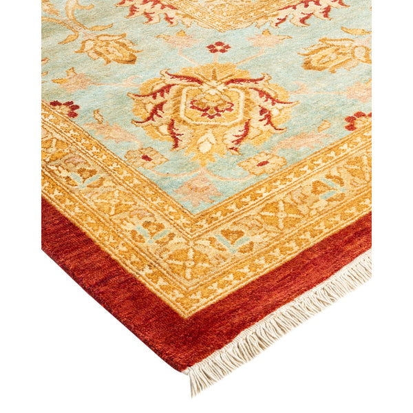 Intricately designed handwoven rug with floral medallion and plush pile.