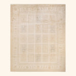 Rectangular cream carpet with subtle monochromatic design and symmetrical pattern