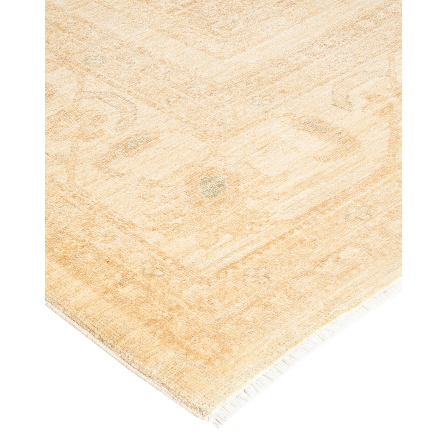 Vintage-inspired patterned rug with subtle faded design on white backdrop.