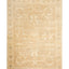 Faded vintage-style rug in neutral beige with subtle floral design