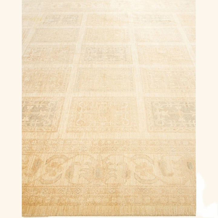 Elegant cream rug showcases subtle grid pattern with decorative motifs