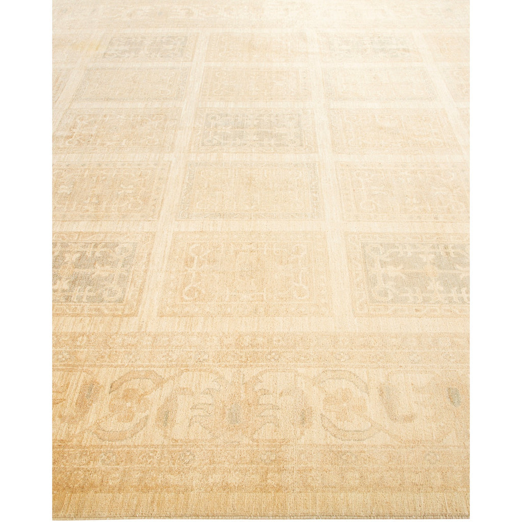Elegant cream rug showcases subtle grid pattern with decorative motifs