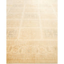 Elegant cream rug showcases subtle grid pattern with decorative motifs