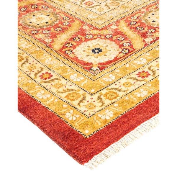 Vibrant and intricate carpet with geometric and floral patterns.