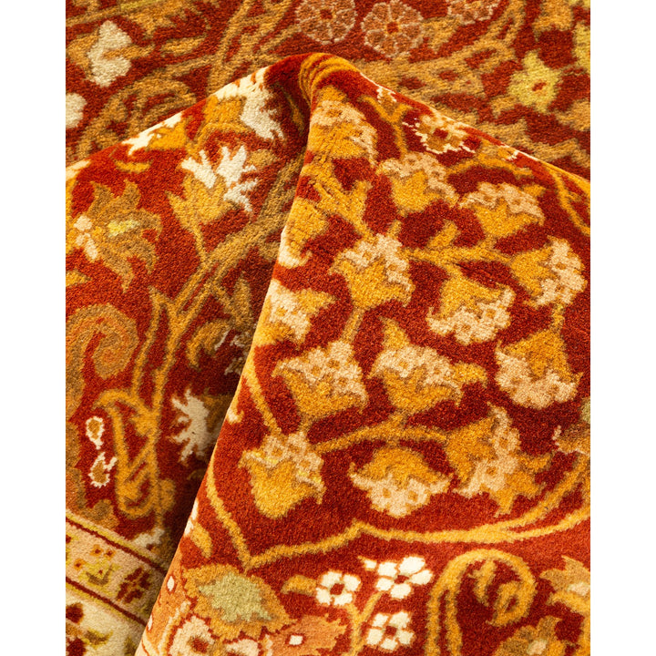 Close-up of a luxuriously patterned, plush carpet in warm tones.