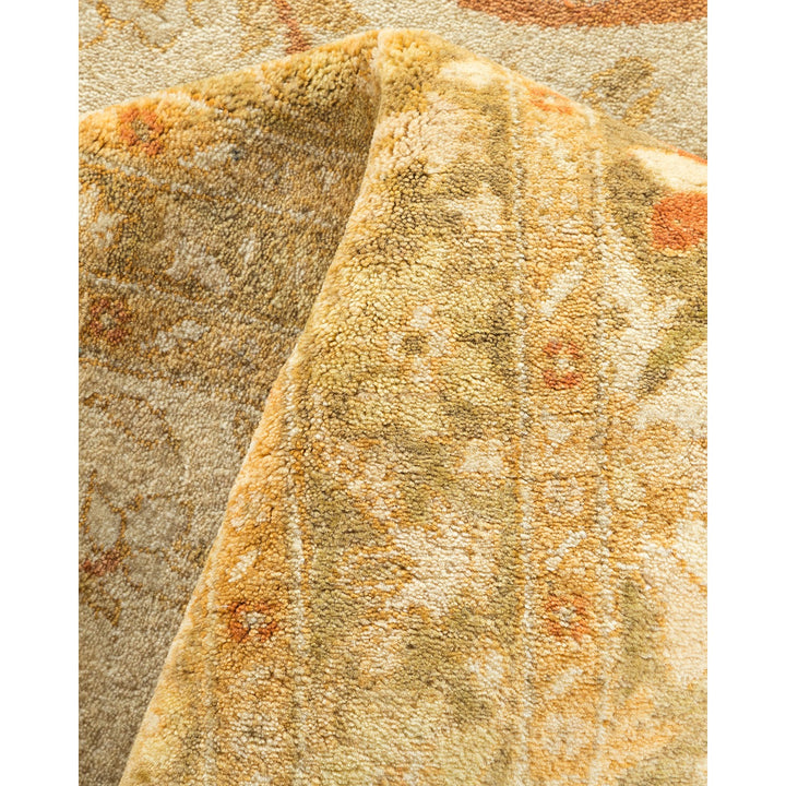 Close-up of a soft, thick pile carpet in warm colors.