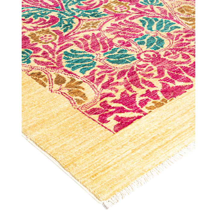 Vibrant floral rug with intricate pattern, fringe detail, Middle Eastern influence.