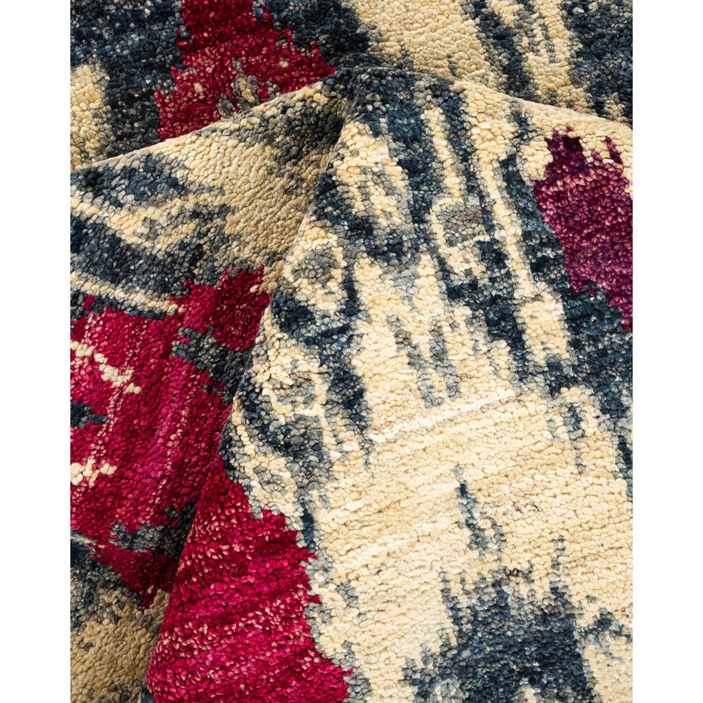 Close-up of a vibrant, textured area rug with abstract design