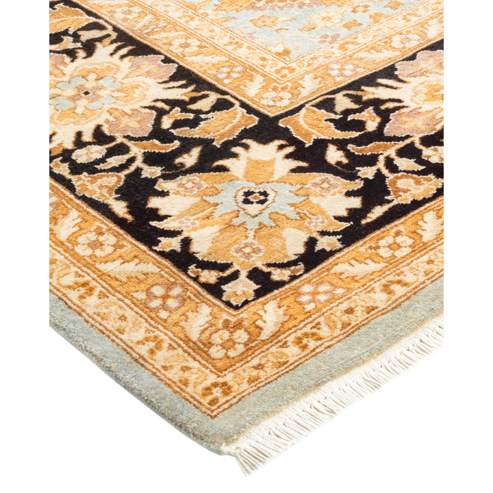 Close-up of an ornate Persian/Oriental rug with intricate floral motifs