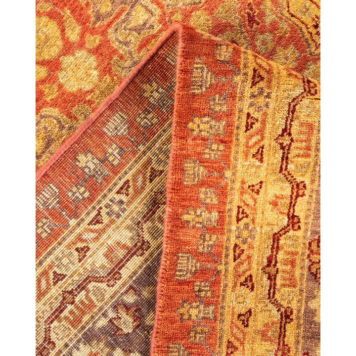 A detailed, handcrafted rug showcasing intricate patterns and warm colors.