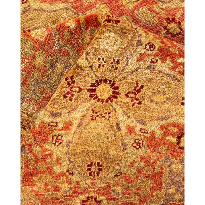 Close-up of a detailed oriental carpet showcasing intricate floral motifs.