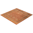 Vibrant, handwoven oriental rug showcases intricate floral design and rich colors.