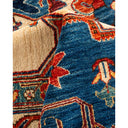 Close-up of a richly textured and colorful Persian-inspired rug.