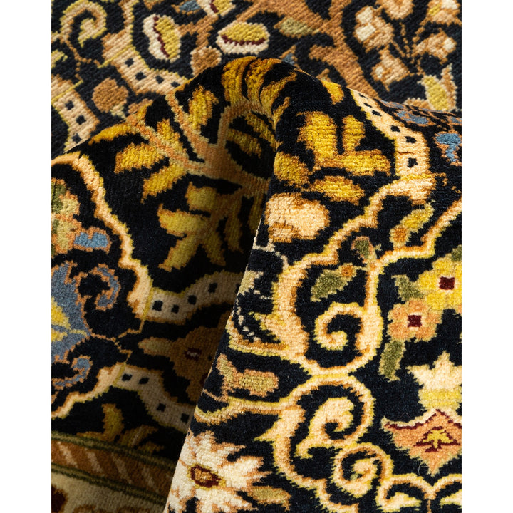 Intricate, ornate fabric with rich colors and elaborate design.