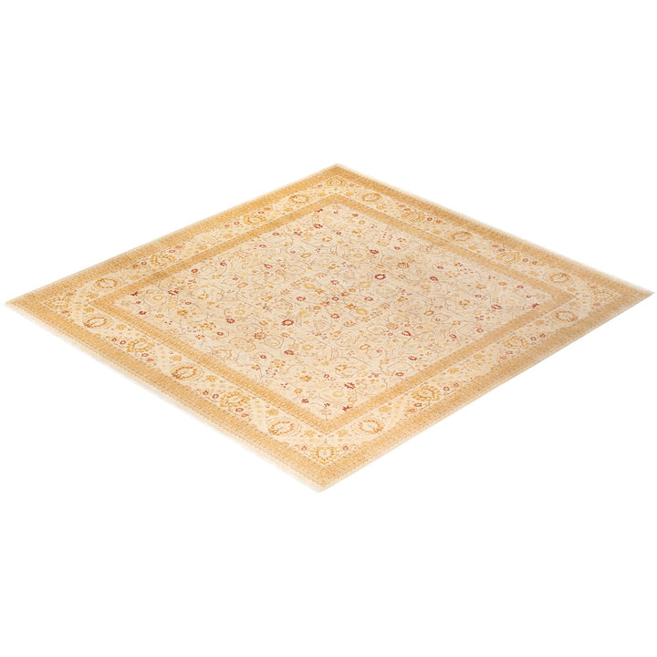 Intricate symmetrical rug with muted colors and floral motifs.