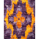 Vibrant and intricate traditional rug showcases symmetrical mirrored design.