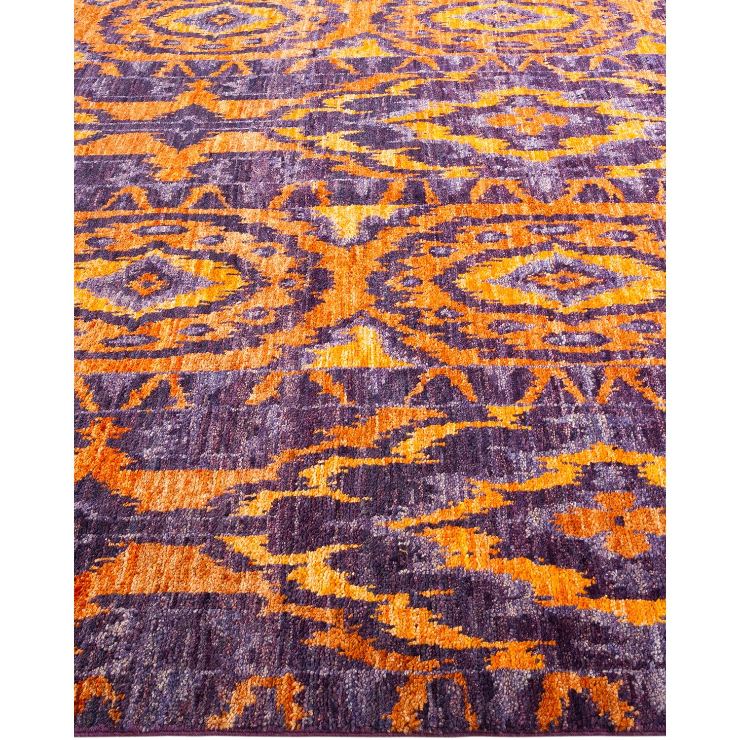 Intricate and vibrant rug with symmetrical floral and geometric motifs.