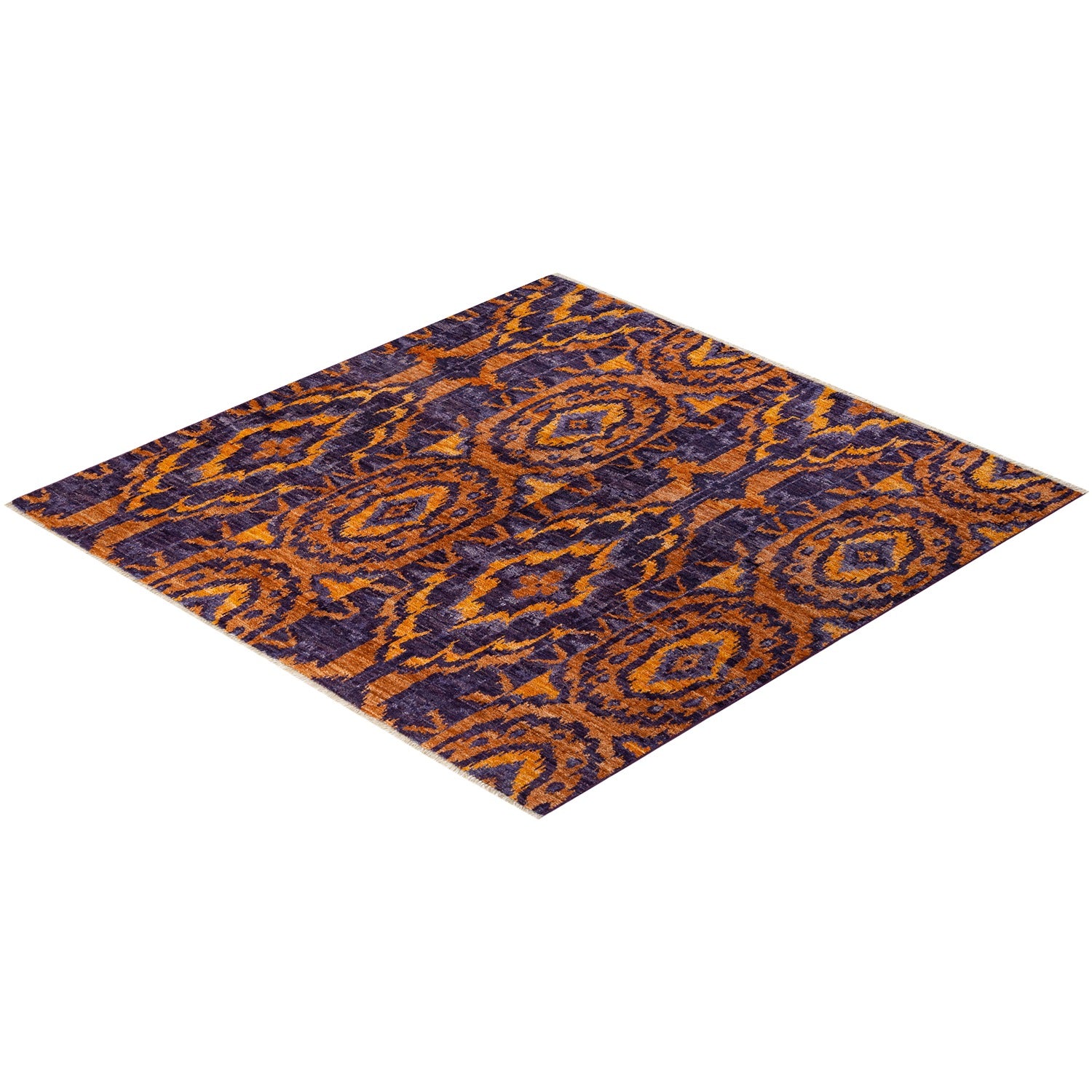 Rectangular rug with diamond-like shape and intricate purple-orange design.