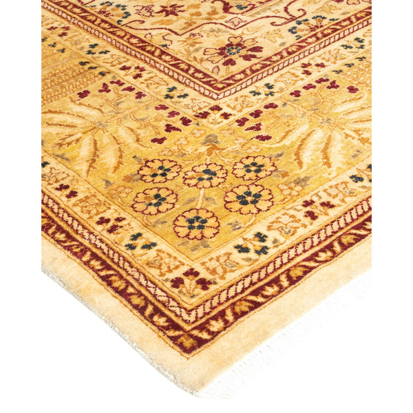 Richly patterned handcrafted rug with intricate floral motifs in vibrant colors.