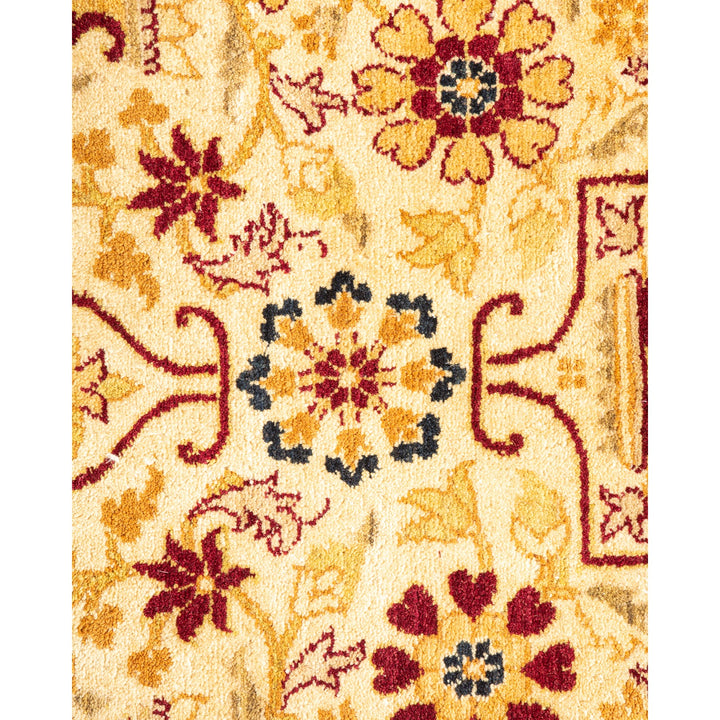 Exquisite burgundy, golden yellow, and deep blue floral carpet design.