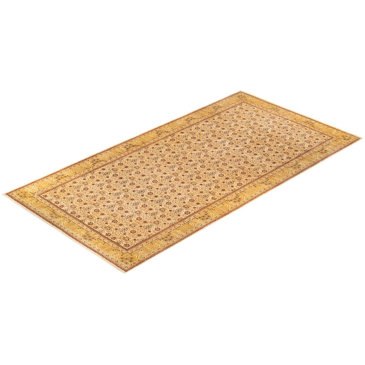 Intricate, symmetrical Oriental rug with detailed motifs in beige and brown.