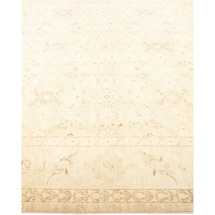 Neutral-toned floral-patterned carpet with ornate medallion in center, versatile for any interior design.