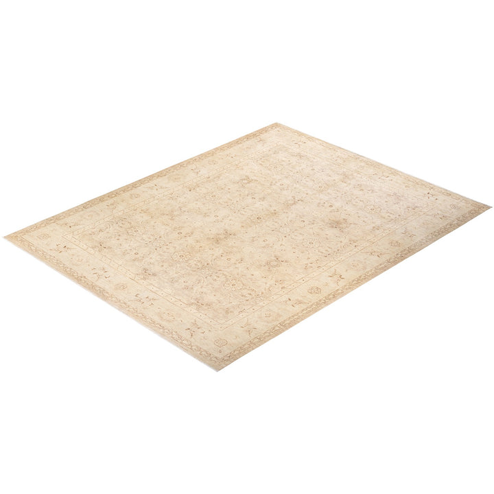 Rectangular area rug with intricate ornate pattern, slightly askew.