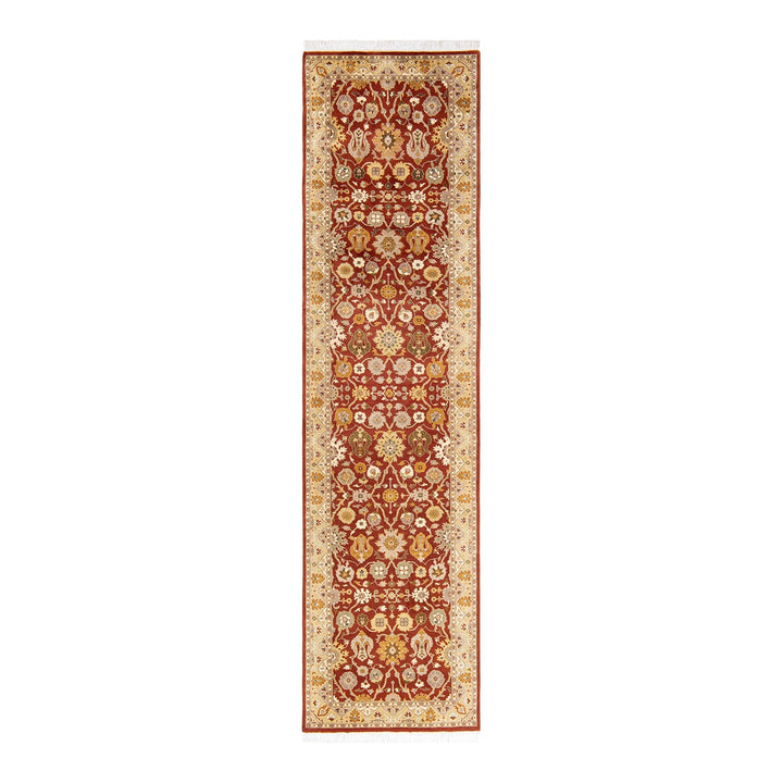 Detailed, symmetrical Oriental runner rug with rich red and cream colors.