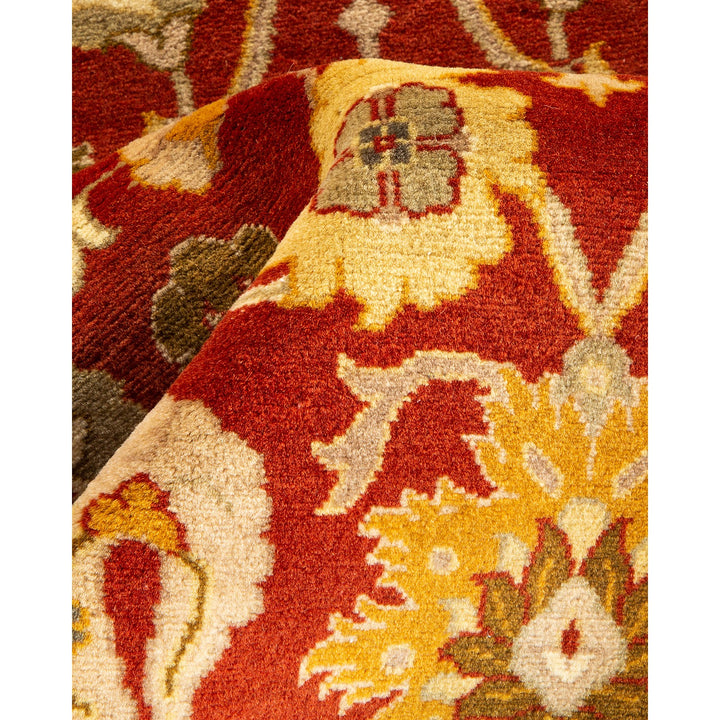 Intricate and elegant traditional carpet with dense pile and rich colors.