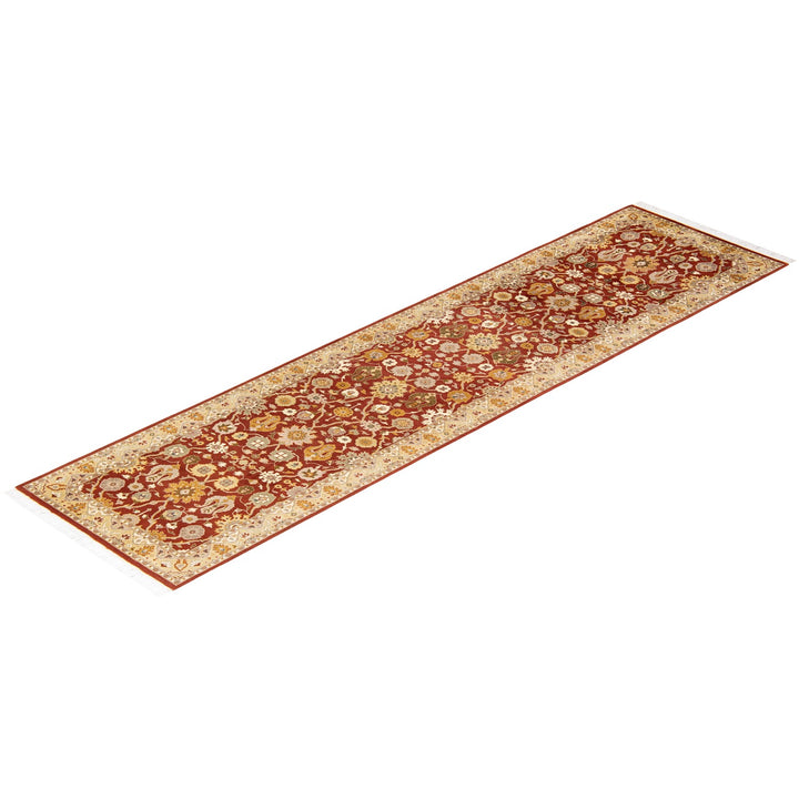 An ornate, detailed rug runner featuring intricate floral motifs.