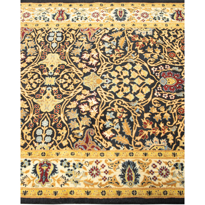 Exquisite handwoven Oriental rug with intricate botanical designs on dark background.
