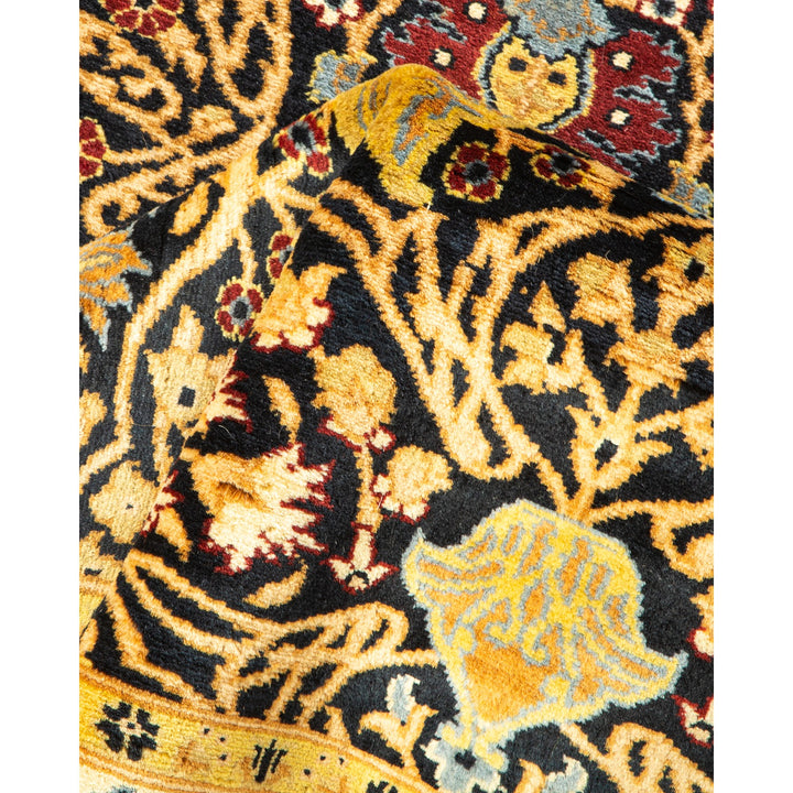 Intricate handcrafted rug exhibits elaborate floral motifs in rich colors.