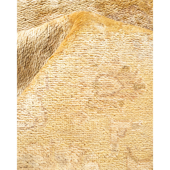 Close-up of soft, fibrous material in creamy, off-white hue.