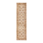 An intricately patterned runner rug with a traditional, antique look.