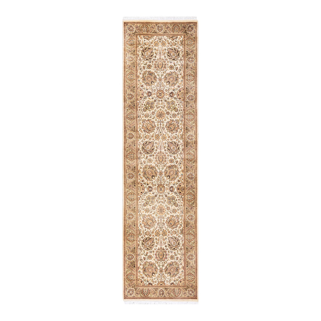 An intricately patterned runner rug with a traditional, antique look.