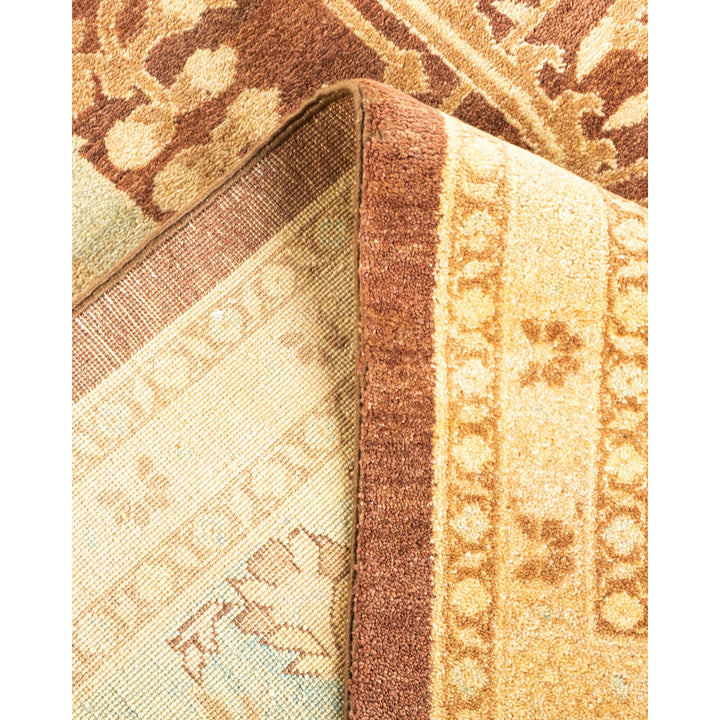 Close-up of overlapping rugs with intricate patterns in earthy tones