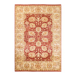 Exquisite oriental rug with intricate patterns in shades of red and cream.