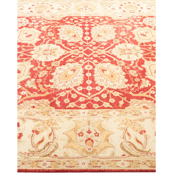 Exquisite handwoven Persian-style carpet features intricate floral motifs and geometry.